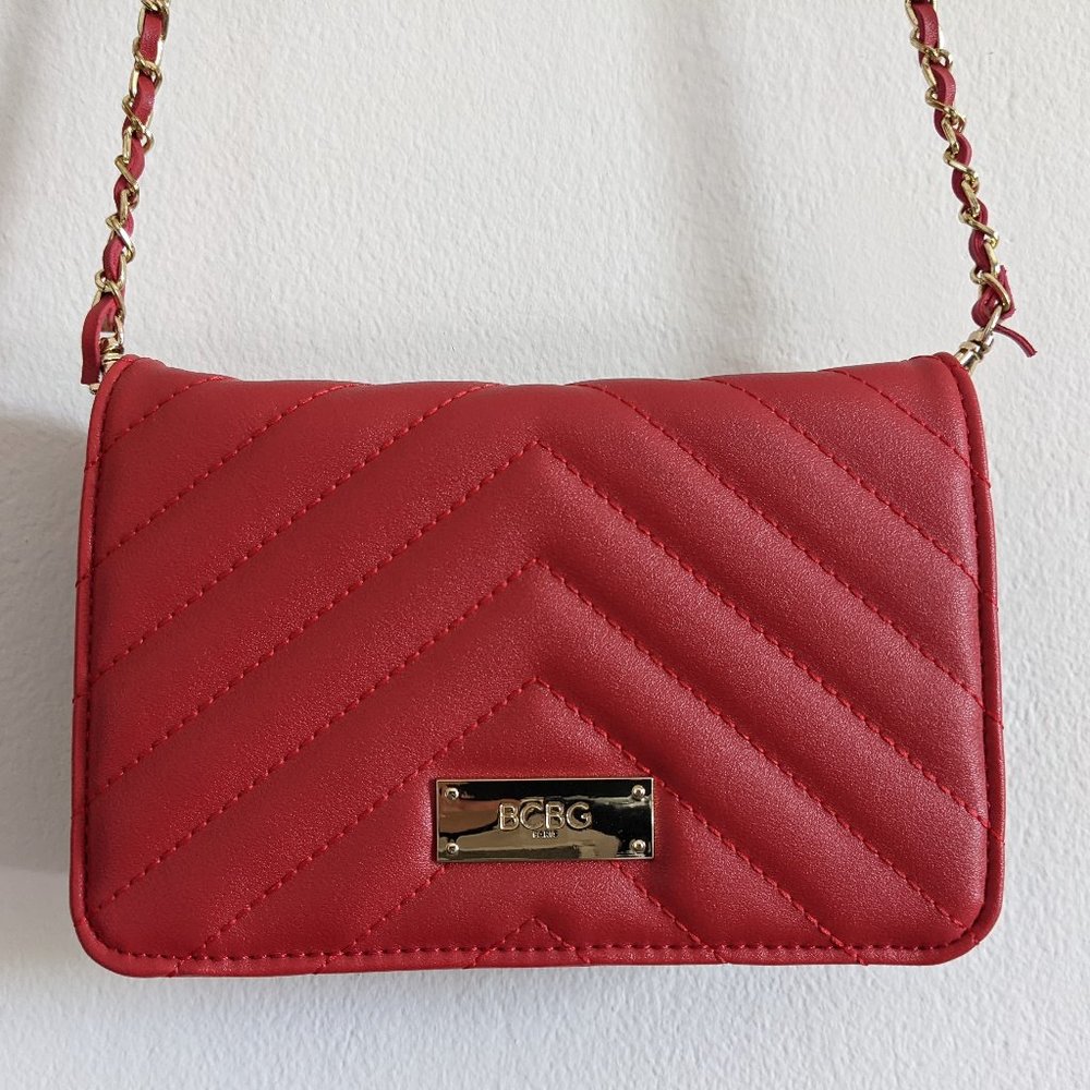 Red quilted crossbody BCBG Paris clutch purse with removable strap